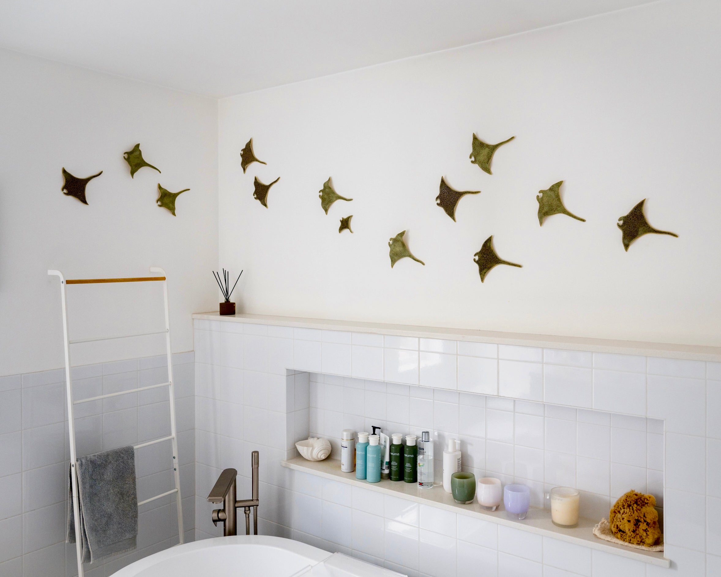 Natural clay wall sculpture with organic shapes
Detail of ceramic wall texture