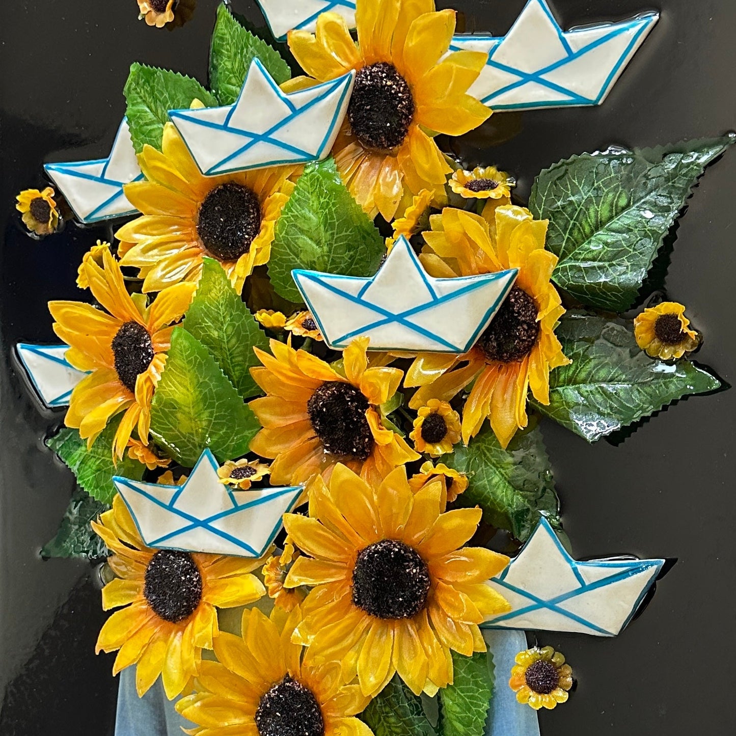 Handmade mixed-media wall art combining ceramic elements, collages, resin, and silk flowers for modern home decor