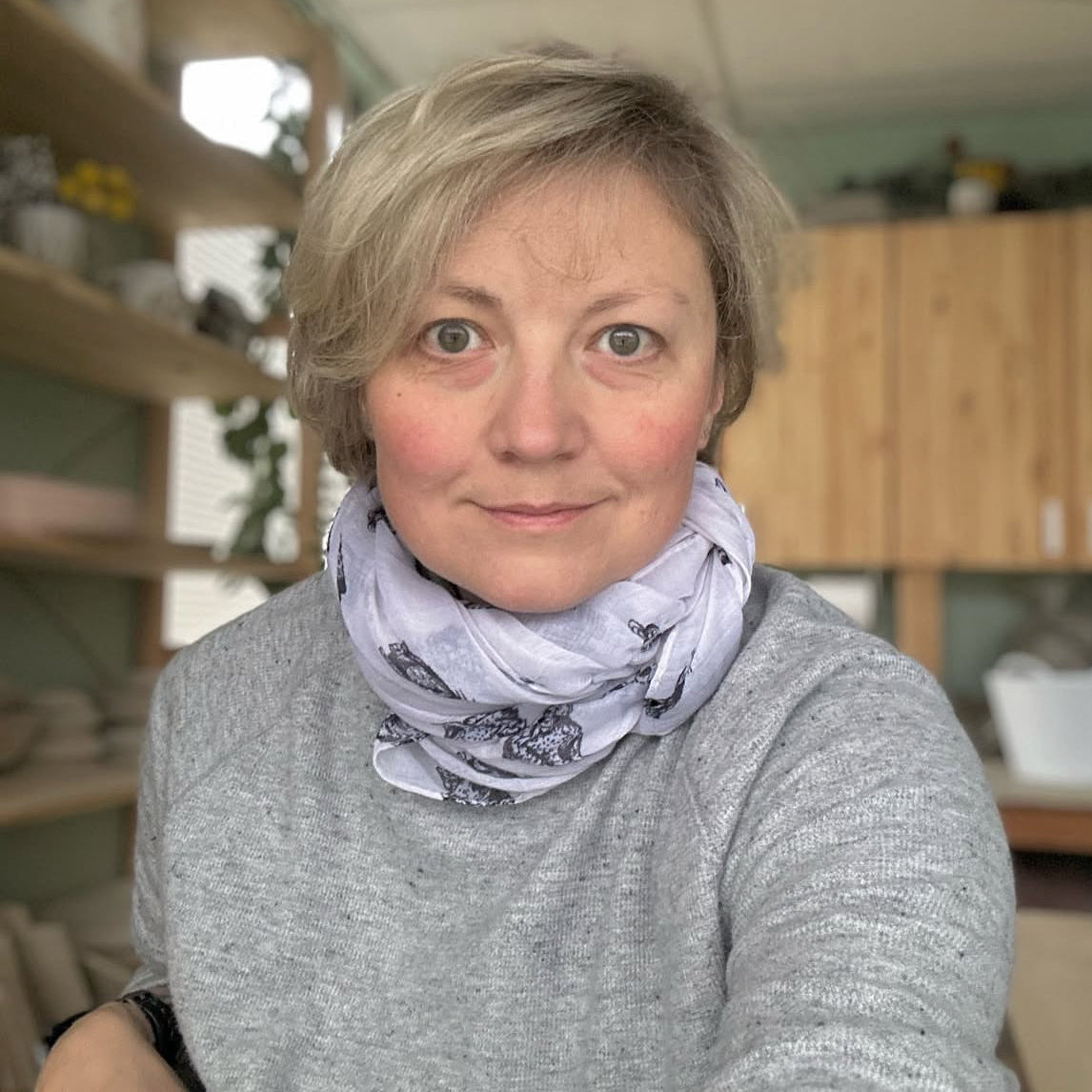 Artist Natalya in Seattle studio working with clay