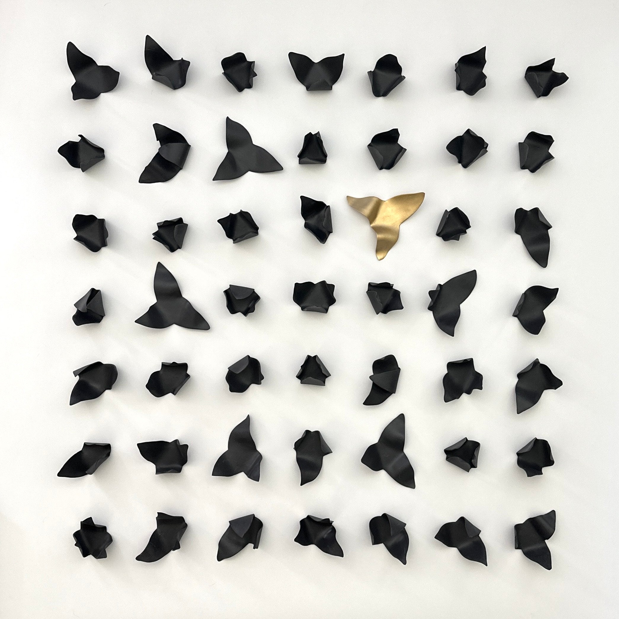 Custom wall art project combining ceramic forms and architectural rhythm in Seattle